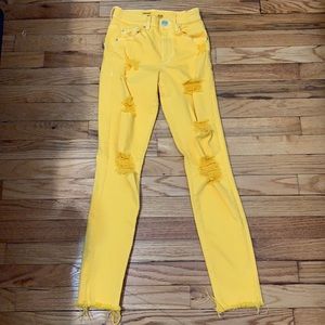 Yellow garage super ripped jeans